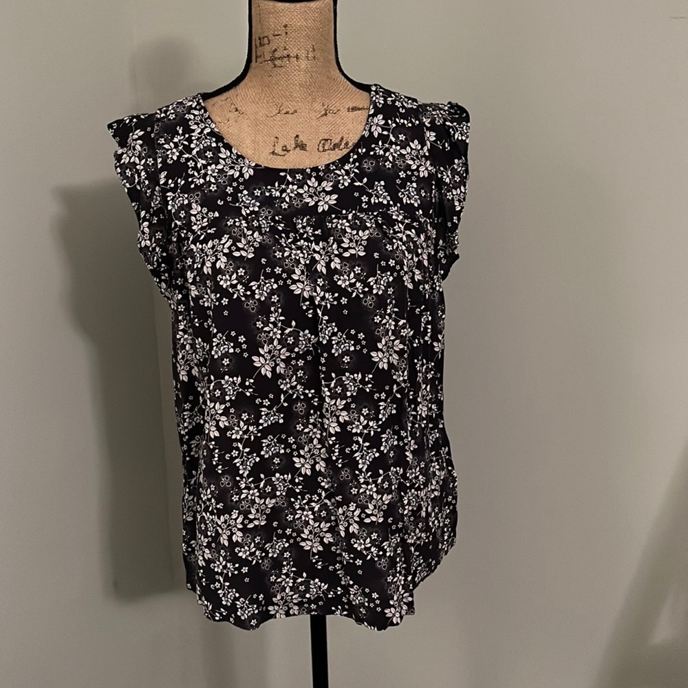 Blue floral sleeveless blouse